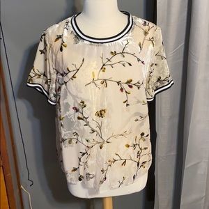 Slightly sheer floral top